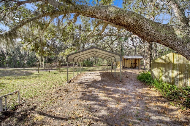 view of yard with a detached carport