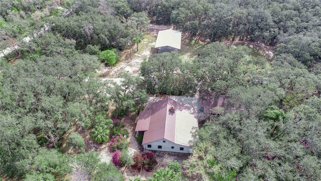 bird's eye view featuring a forest view