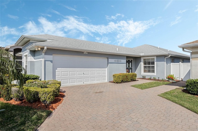 ranch-style home with a garage