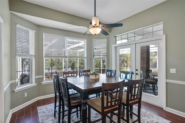 dining room with plenty of natural light, french doors, and ceiling fan