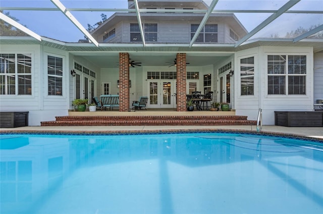 back of property with a patio area, ceiling fan, and french doors