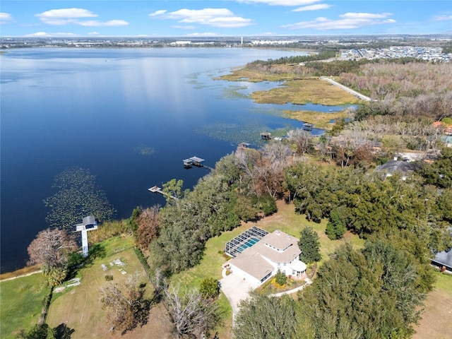 birds eye view of property featuring a water view