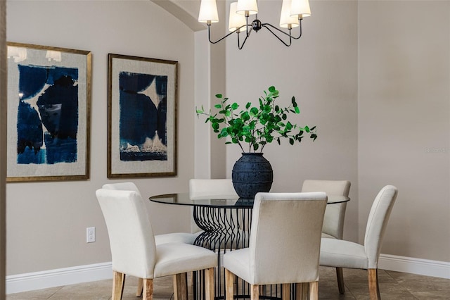 dining area featuring an inviting chandelier