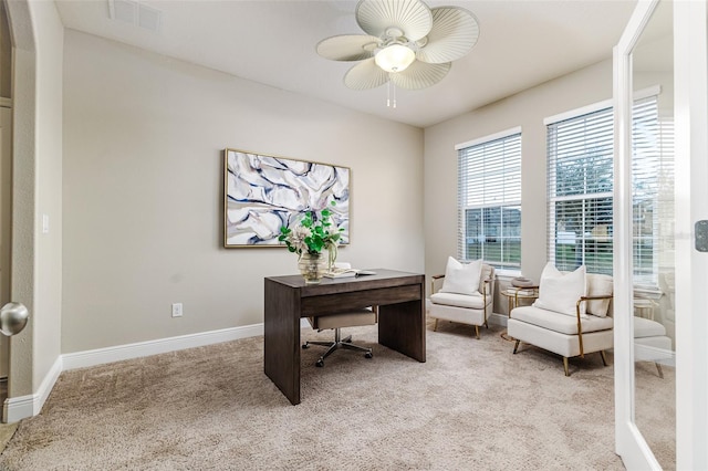 home office with light colored carpet and ceiling fan