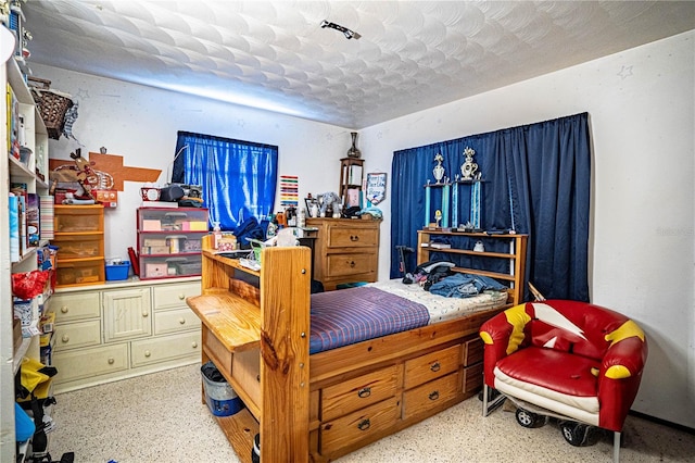 bedroom with a textured ceiling