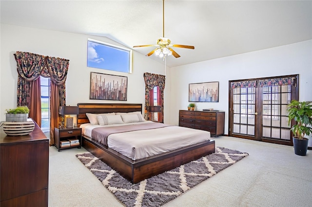 carpeted bedroom featuring ceiling fan and lofted ceiling