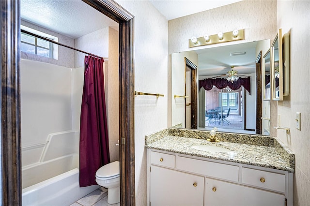 full bathroom with vanity, plenty of natural light, shower / tub combo with curtain, and toilet