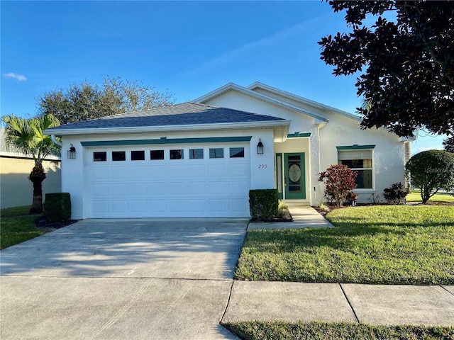 single story home featuring a garage and a front lawn