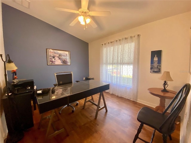 office area with vaulted ceiling, hardwood / wood-style floors, and ceiling fan