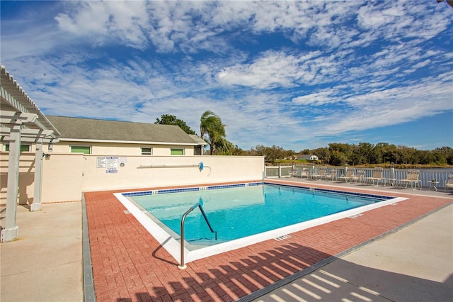 view of swimming pool featuring a patio