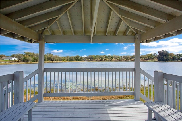 deck with a water view and a gazebo