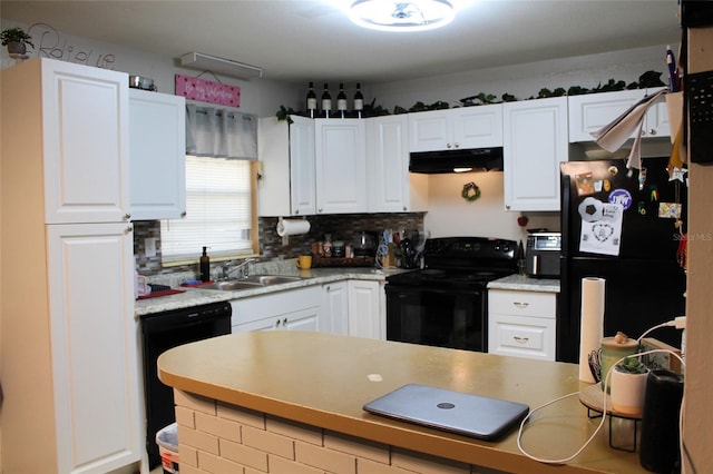 kitchen with white cabinetry, sink, decorative backsplash, and black appliances