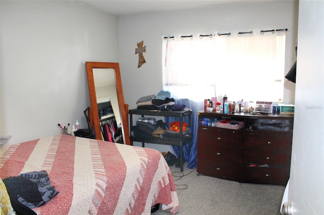 bedroom with light carpet