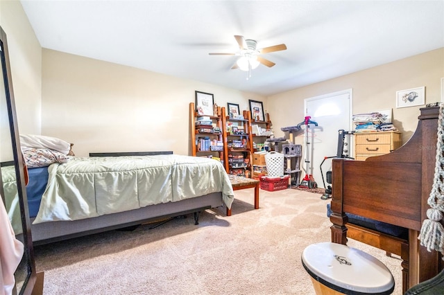 bedroom with light colored carpet and ceiling fan