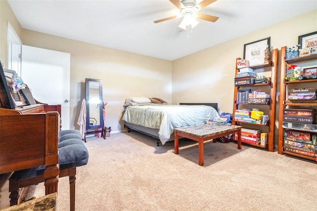 bedroom with light colored carpet and ceiling fan