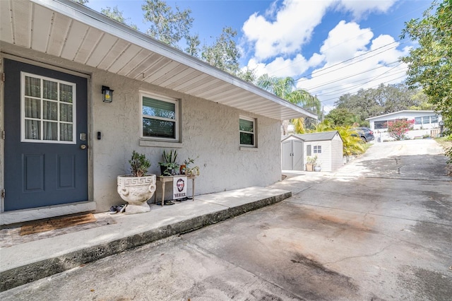 property entrance with a patio