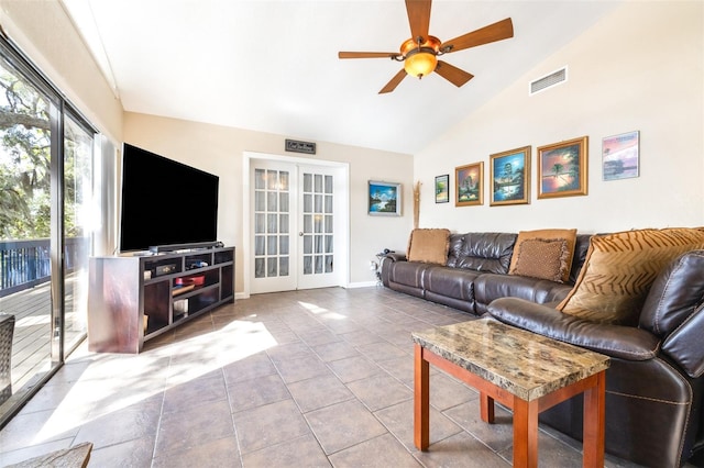 living room featuring high vaulted ceiling, french doors, ceiling fan, and light tile patterned flooring