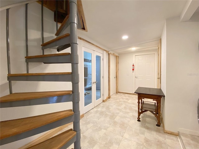 stairway with french doors