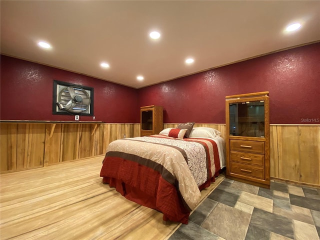 bedroom with wooden walls