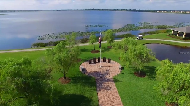 drone / aerial view with a water view