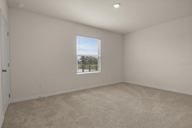 view of carpeted spare room