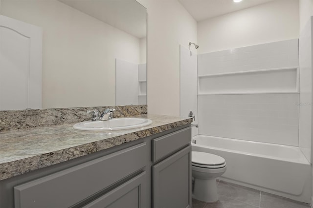 full bathroom featuring vanity, tile patterned floors, toilet, and shower / bath combination