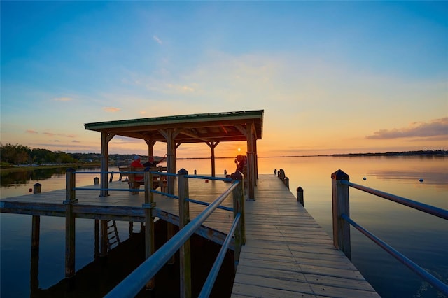 dock area with a water view