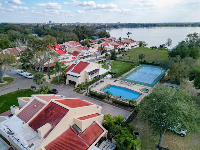 birds eye view of property featuring a water view