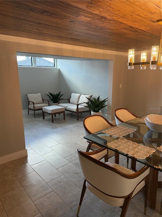 1 Casarena Ct, Winter Haven, FL 33881 - unfurnished dining area featuring tile patterned floors, wood ceiling, and baseboards