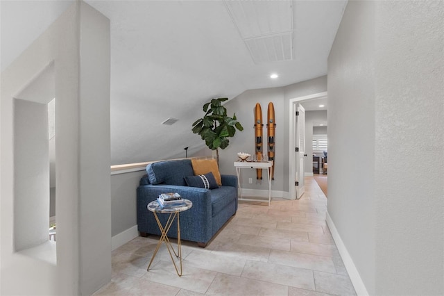 1 Casarena Ct, Winter Haven, FL 33881 - hallway with light tile patterned floors, baseboards, vaulted ceiling, and visible vents