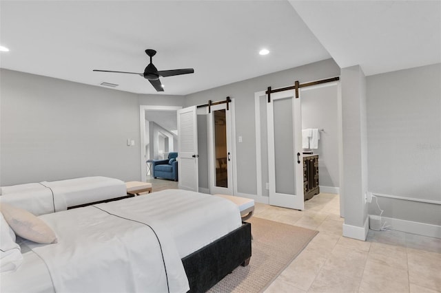 1 Casarena Ct, Winter Haven, FL 33881 - bedroom featuring ceiling fan, recessed lighting, baseboards, and a barn door