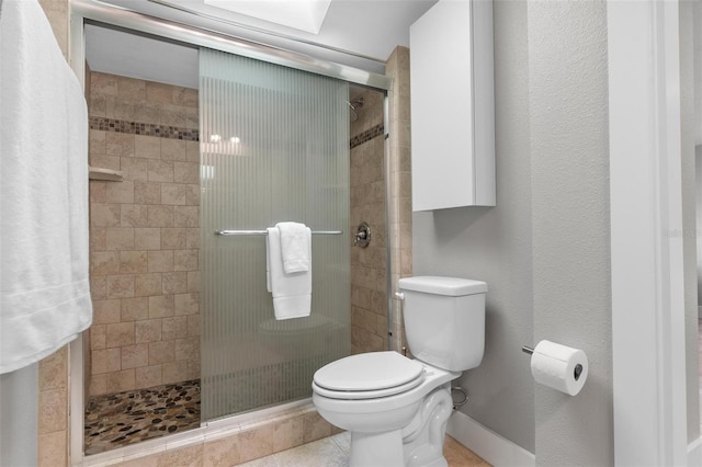 1 Casarena Ct, Winter Haven, FL 33881 - bathroom featuring toilet, baseboards, and a shower stall