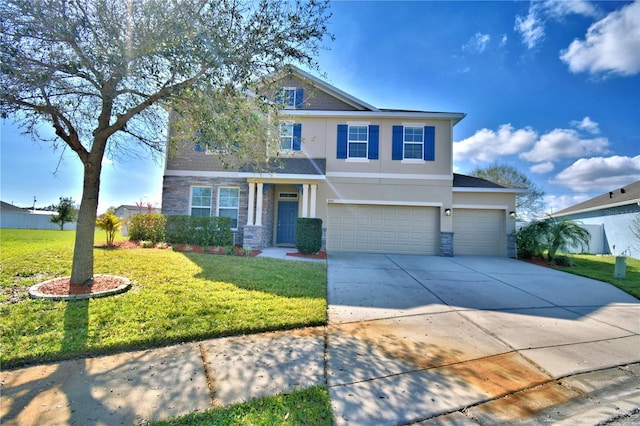 view of front of house featuring a garage and a front yard