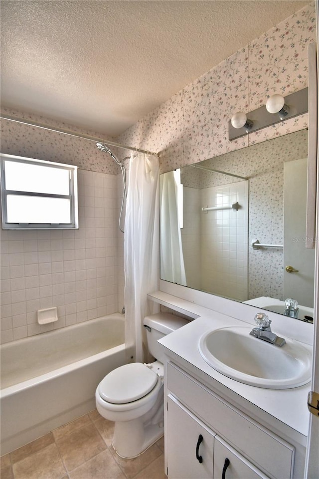 full bathroom with tile patterned floors, toilet, a textured ceiling, vanity, and shower / bath combination with curtain