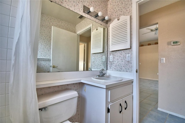 bathroom featuring vanity, ceiling fan, tile patterned floors, and toilet