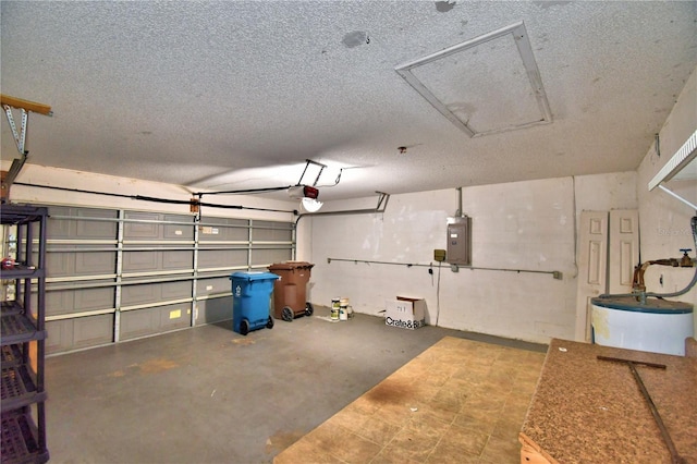 garage featuring a garage door opener, electric panel, and water heater