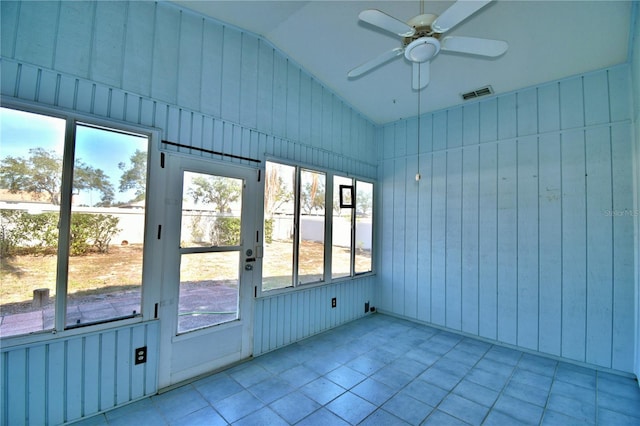 unfurnished sunroom with lofted ceiling and ceiling fan