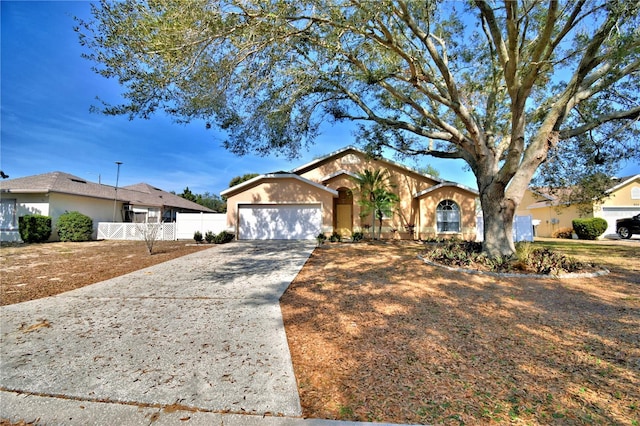 ranch-style home with a garage