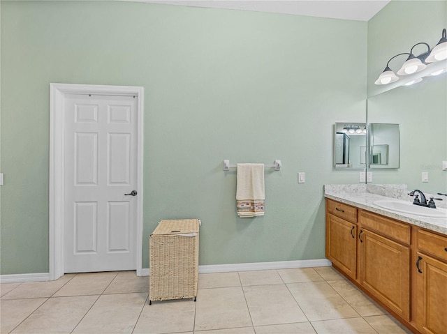 bathroom with vanity and tile patterned flooring