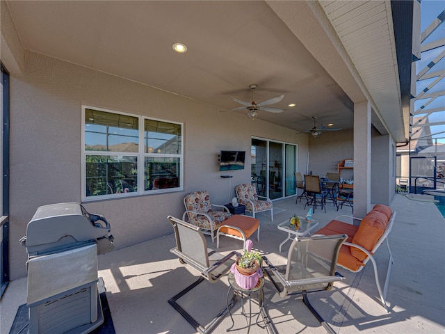 view of patio with ceiling fan