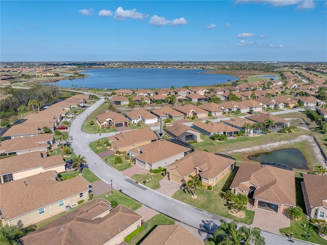 drone / aerial view with a water view