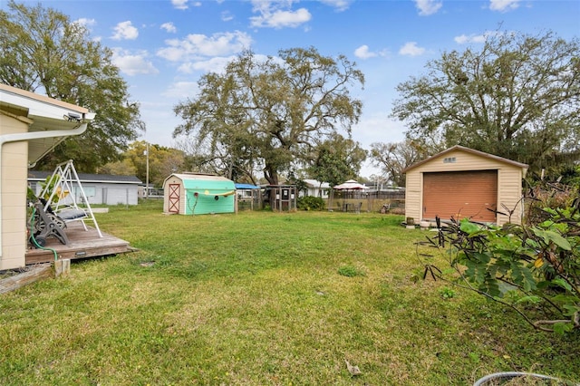 view of yard with a storage unit