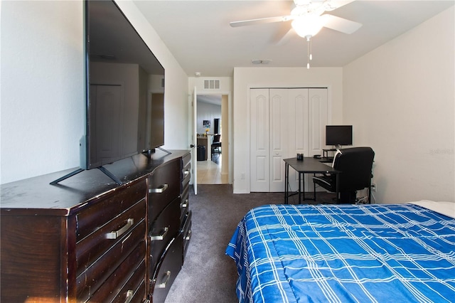 bedroom featuring a closet, ceiling fan, and dark colored carpet