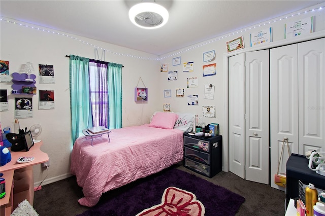 carpeted bedroom with a closet