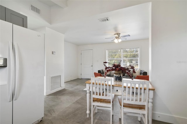 dining room with ceiling fan