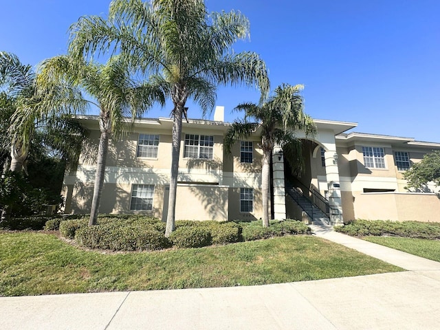 exterior space with a front lawn