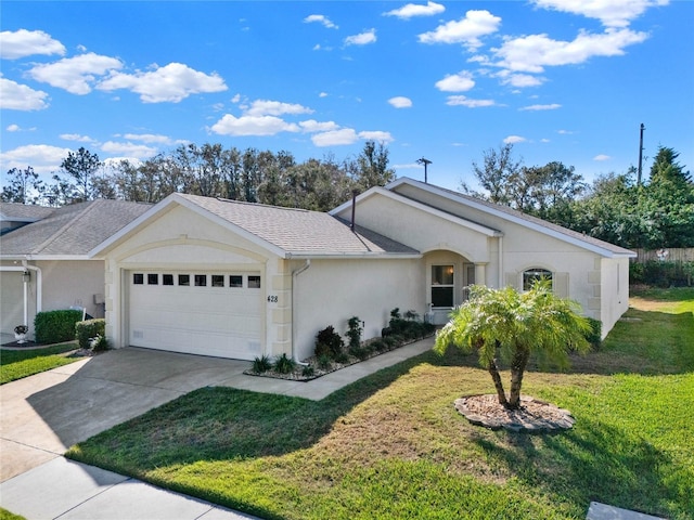 single story home with a garage and a front yard