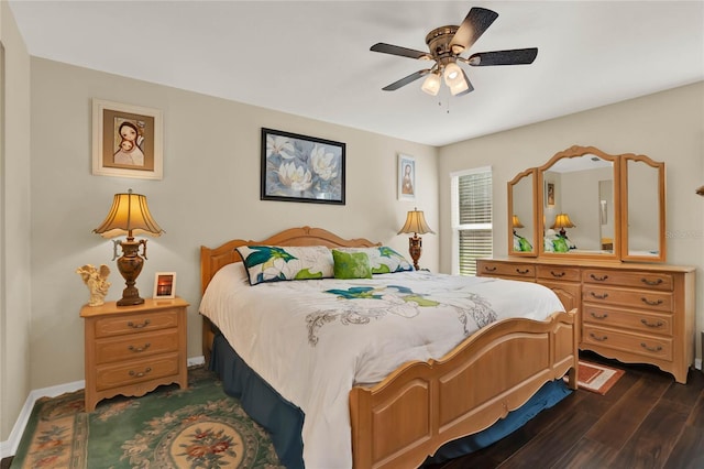 bedroom featuring ceiling fan and dark hardwood / wood-style flooring