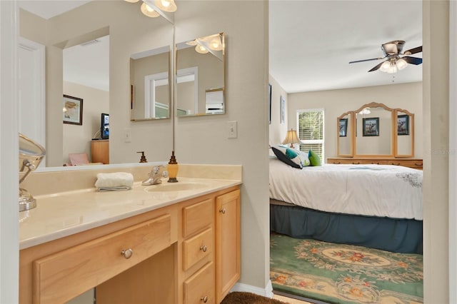 bathroom with vanity and ceiling fan