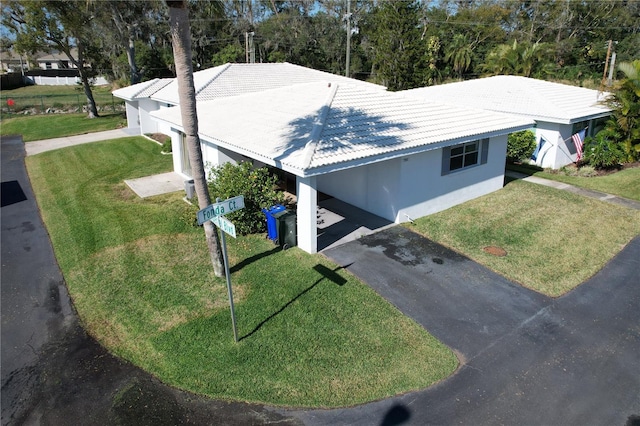 exterior space featuring a front lawn